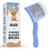 We Love Doodles slicker brush dogs closeup — detangles gently for silky coats.