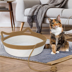 WEAVELYRICS cat bed with teaser ball for interactive play while resting.