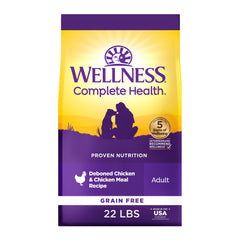 Wellness Complete Health chicken dry dog food 22 lb bag illustrating grain-free nutrition for adults.