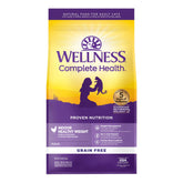 Wellness Complete Health Indoor Cat Food bag displays 11.5 lb size for daily feeding.
