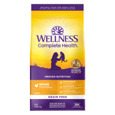 Wellness Complete Health indoor chicken kibble bowl showing grain-free nutrition for indoor cats