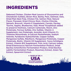 Wellness Complete Health skin and coat kibble with omega fatty acids for shiny fur.