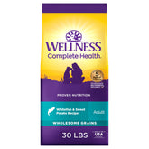 Wellness Complete Health bag showing protein-rich whitefish and sweet potato formula.