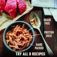 Wellness CORE Signature Selects canned cat food with real meat shreds in sauce.