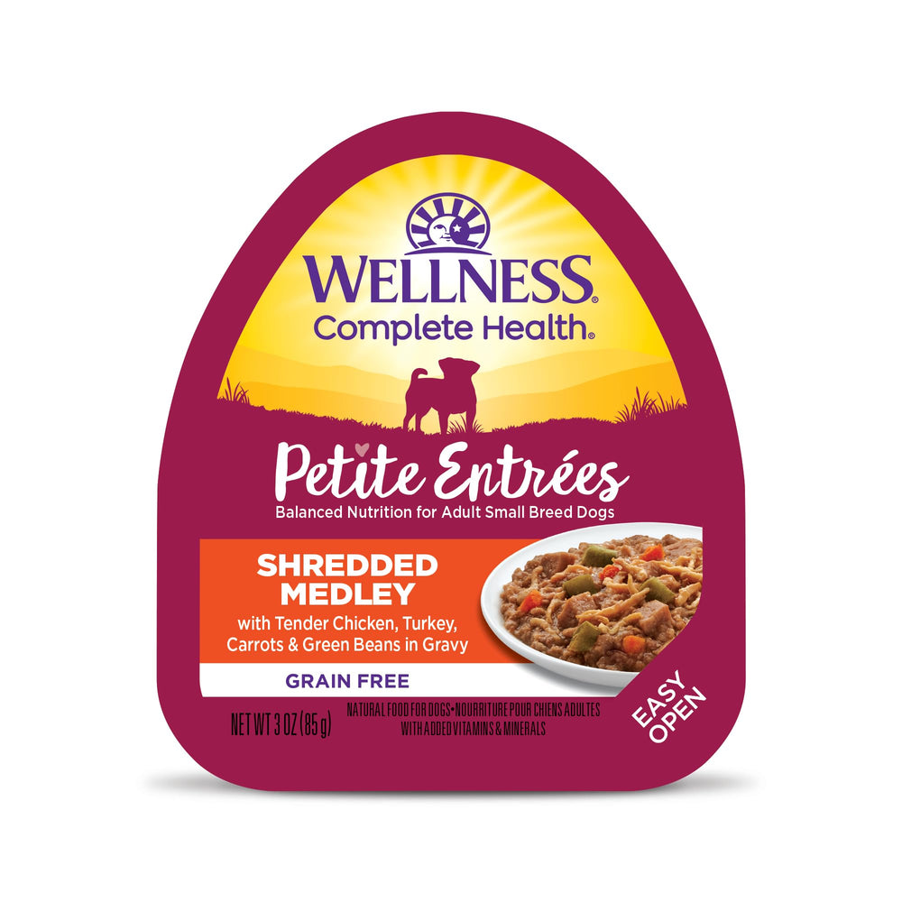 Wellness Petite Entrees small-breed cups closeup shows tender chicken shreds in savory gravy for small dogs