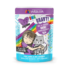 Weruva B.F.F. OMG cat food in gravy bowl showing juicy beef and chicken chunks for moisture