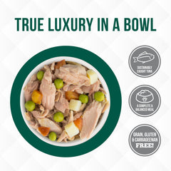 Cat enjoying tuna in gravy from Weruva TruLuxe Mediterrane an Harvest.