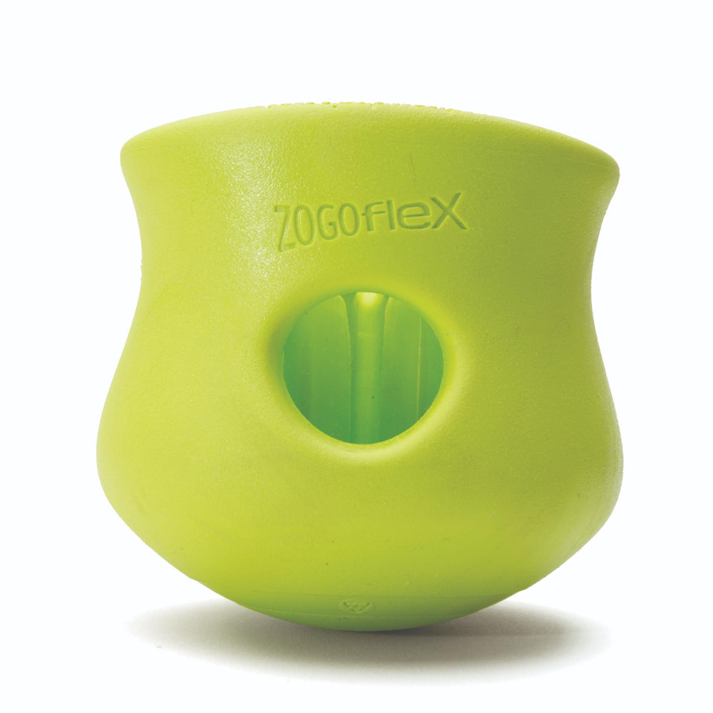 West Paw Toppl treat-dispensing toy demonstrates puzzle play that slows feeding and rewards exploration.