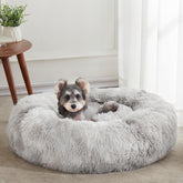 WESTERN HOME WH calming-donut-bed-faux-fur-round provides cozy, secure sleep.