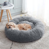 WESTERN HOME WH calming donut bed in faux fur for warm, cozy naps.