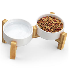 Woodever bamboo elevated cat bowls with tilted stand for comfortable, whisker-friendly meals.