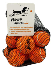 Woof Sports small 1.9-inch orange tennis ball for small dogs, high visibility during fetch.
