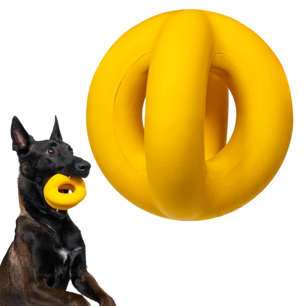 WoofBite indestructible ball in bright yellow for aggressive chewers and fetch.