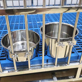 Wrifazaly stainless steel dog bowls mounted to a crate to prevent spills