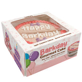 Wufers dog birthday cake in a pink box ready for celebration