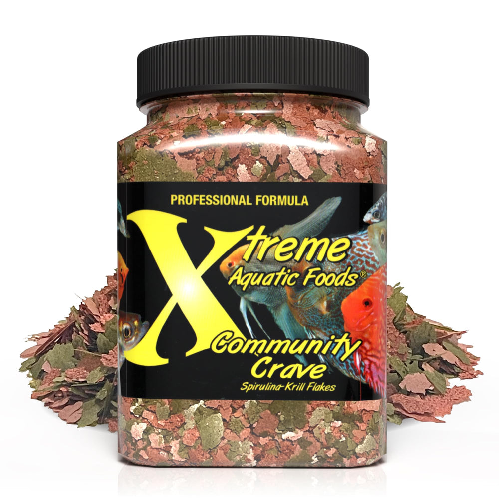 Xtreme Aquatic Foods Community Crave flakes front view, showcasing spirulina-krill blend for vibrant color.
