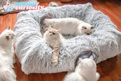 XxingSheep warm-mat donut cat bed provides plush lounging comfort.