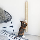 xympo 34-inch wall-mounted scratcher secured to wall for space-saving cat care