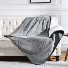 Yaning waterproof blanket on bed provides spill protection and fur resistance.