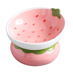 Yeexoxow pink ceramic raised cat bowl for stable indoor feeding.