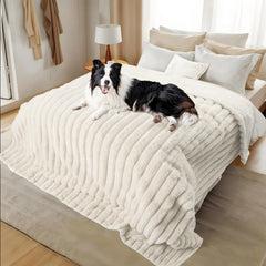 ZAKAPAWS waterproof blanket on bed in cream for cozy protection