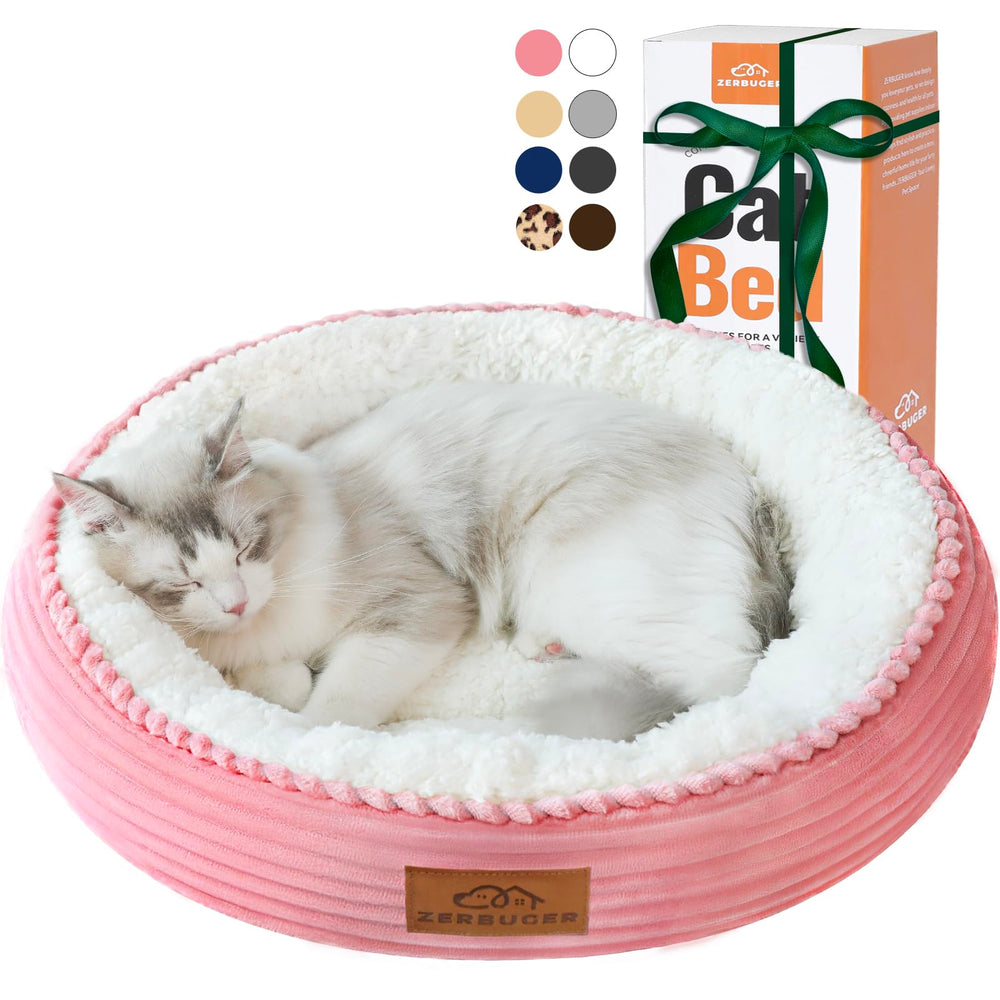 Zerbuger 20in round pink cat bed offers cozy indoor naps with plush donut design.