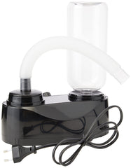 Zoo Med Repti Fogger in a terrarium setup showing even humidity control