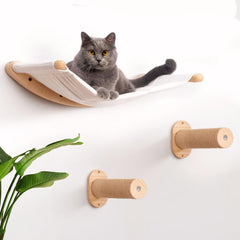 7 Ruby Road Cat Wall Shelves Hammock Set: cat perched on elevated shelves for space saving.