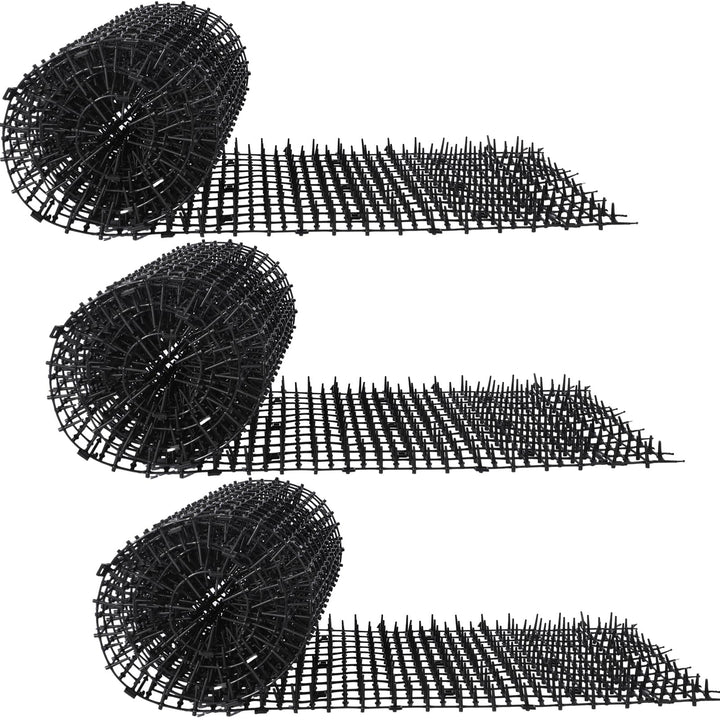 Abbylike cat repellent mat with spikes outdoors deterring cats.