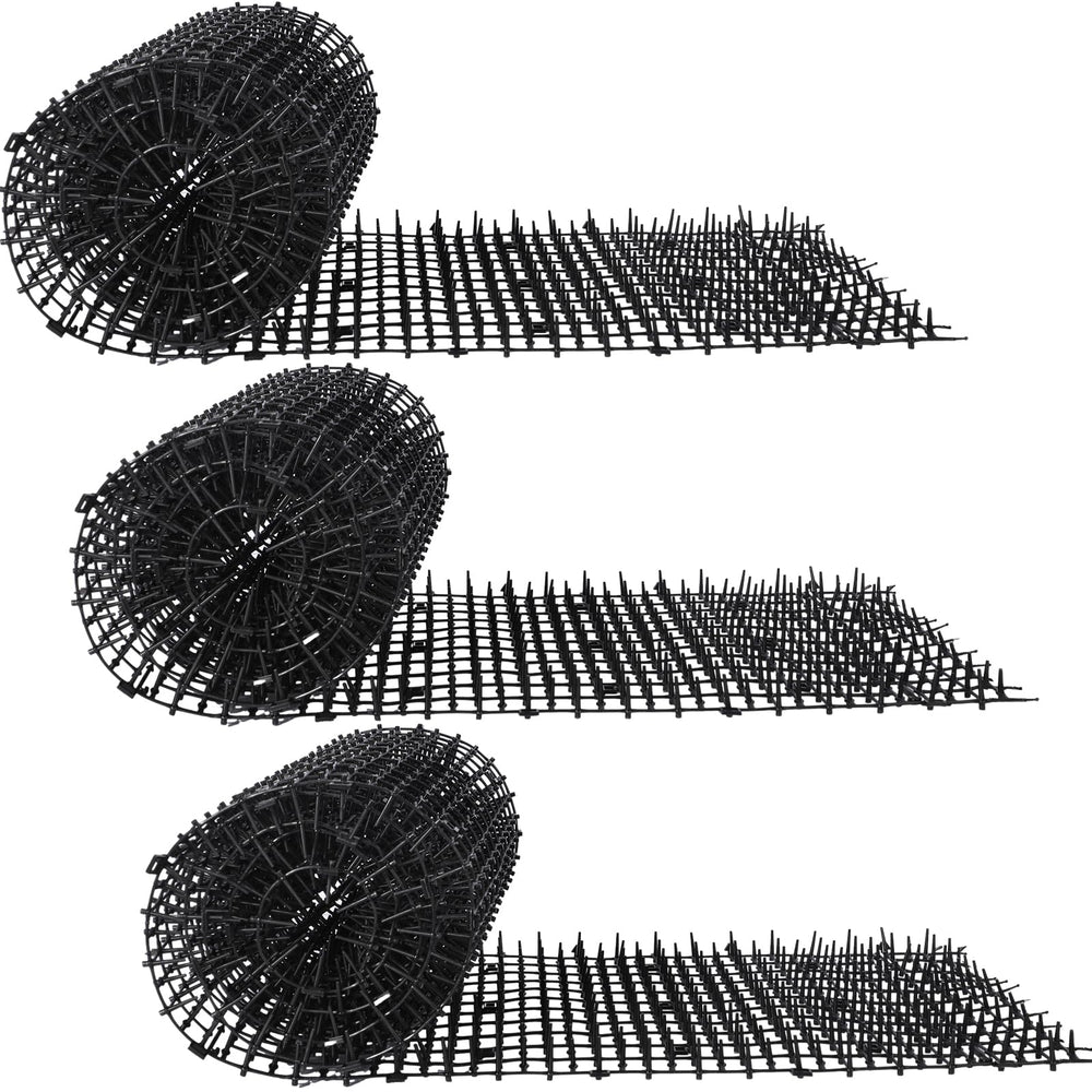 Abbylike cat repellent mat with spikes outdoors deterring cats.