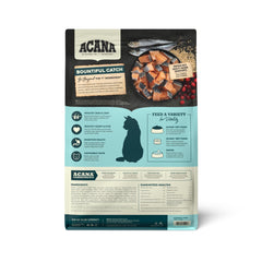 ACANA Bountiful Catch kibble close-up with raw salmon bits for protein flavor.