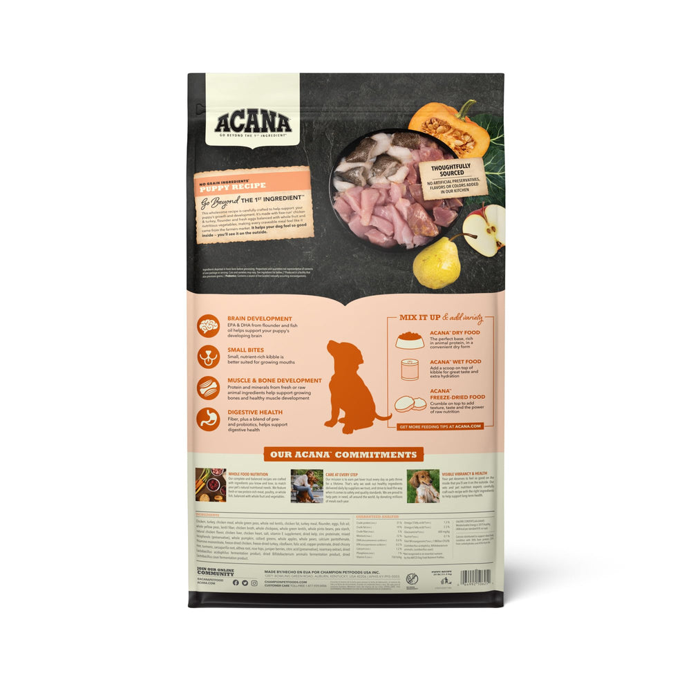 ACANA grain-free puppy kibble close-up emphasizing high-quality animal protein.