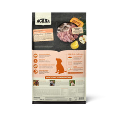 ACANA grain-free puppy kibble close-up emphasizing high-quality animal protein.