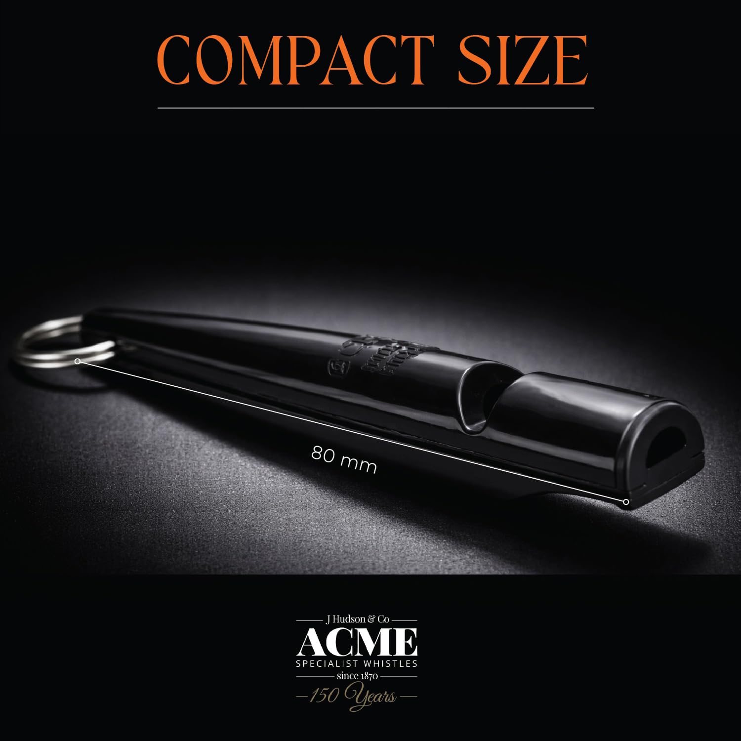 ACME Dog Whistle 210.5 close-up on black finish and grip.