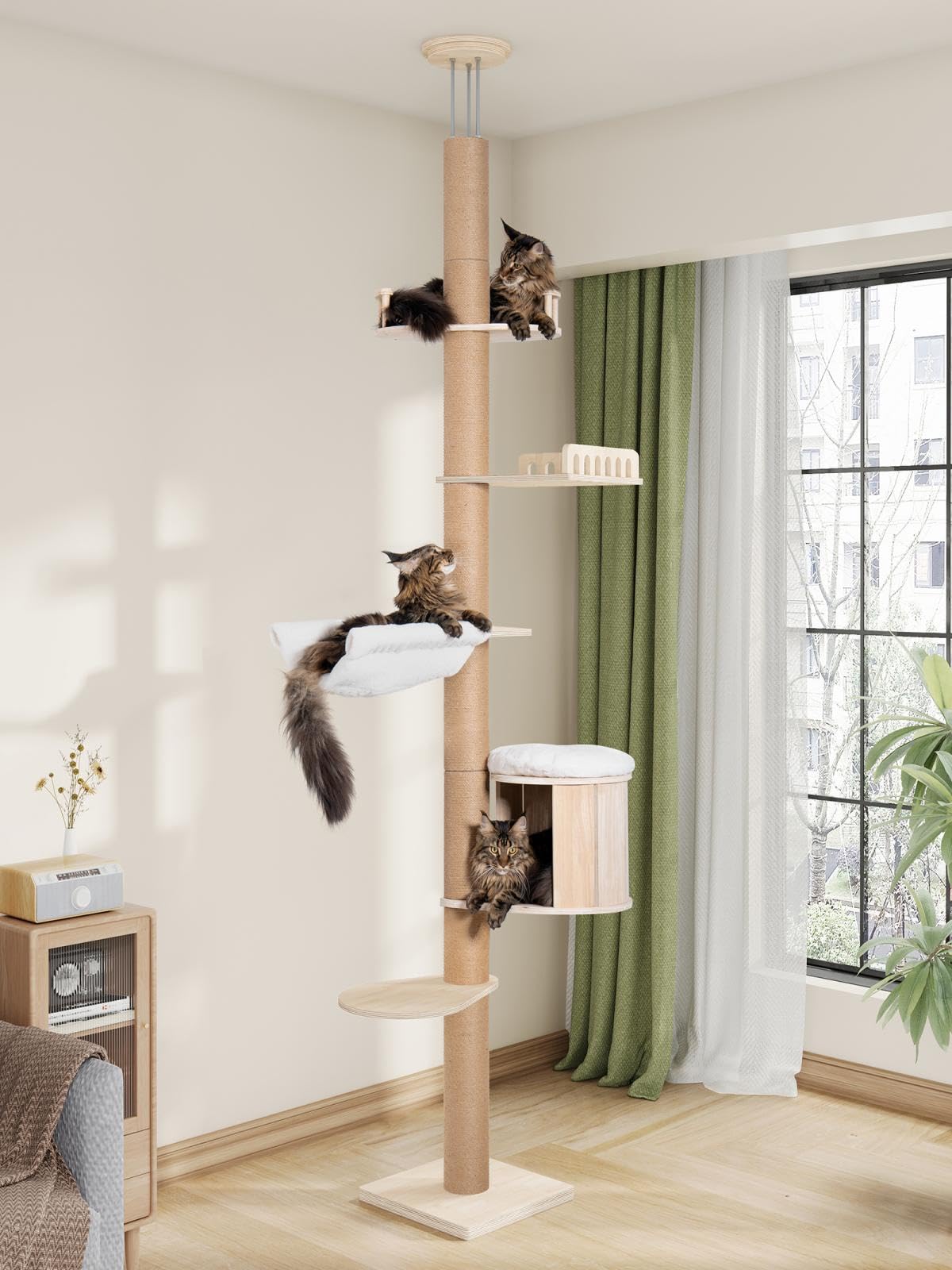 Aechonow floor-to-ceiling cat tree with a large condo cave for big cats.