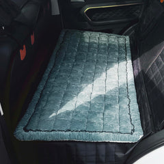 AEEISHOMEREFORM deluxe dog seat cover keeps the back seat clean during travel.