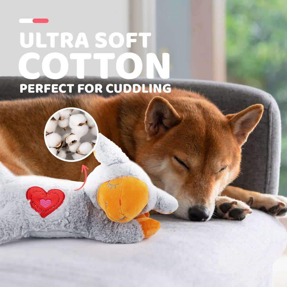 Soothing expression of ALL FOR PAWS heartbeat dog toy during play