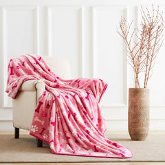Allisandro dog blanket on sofa shows inviting lounging during movie nights.