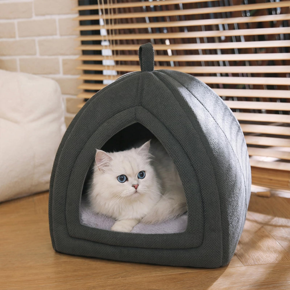 Amazon Basics Cat Cave Bed non-slip base prevents slipping on floors.