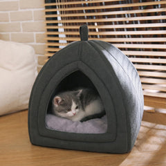 Amazon Basics cat cave bed washable cushion ensures fresh, ready-to-use lounging after playtime.