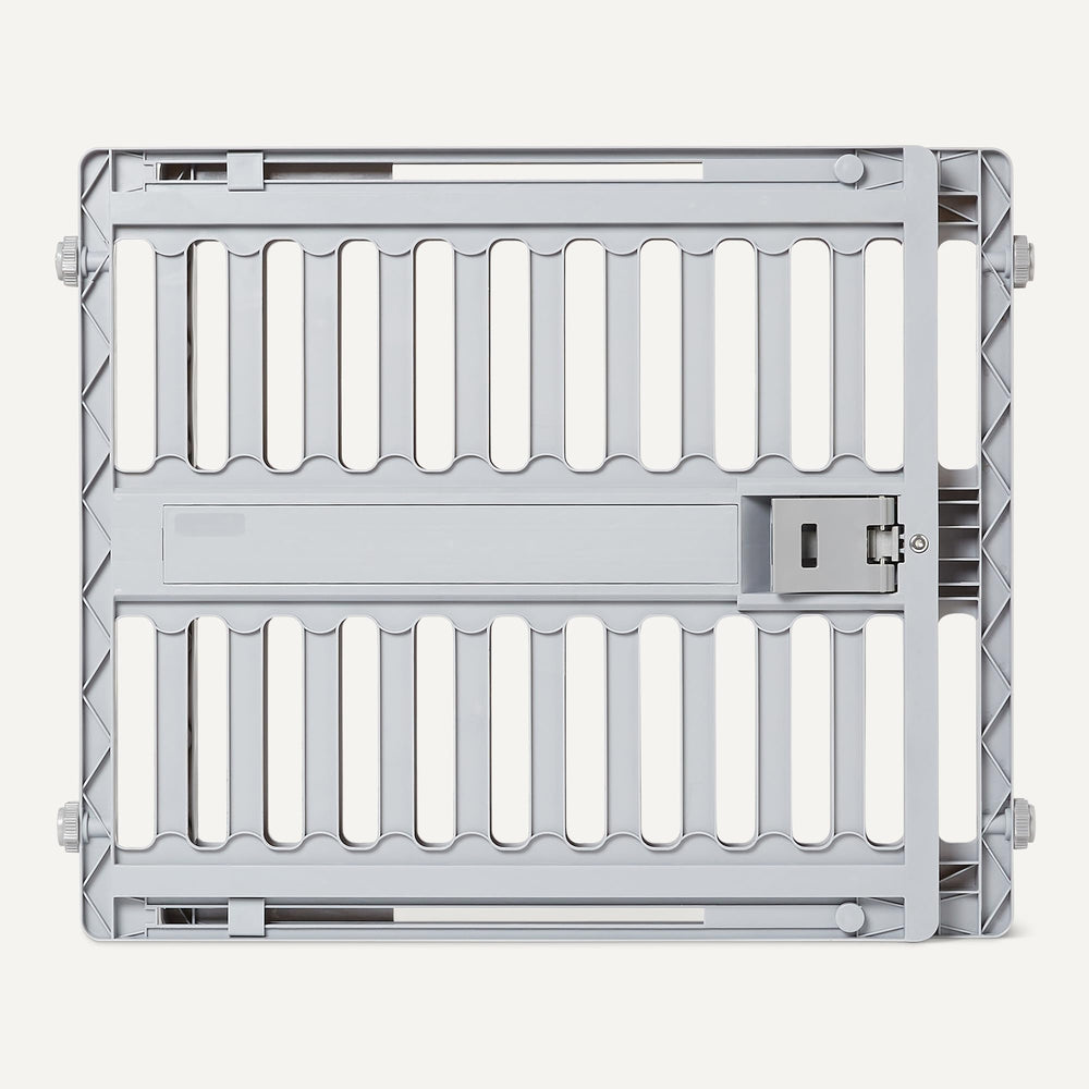 Amazon Basics gate with a single-handle lock for easy operation