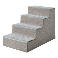 Amazon Basics dog steps at the edge of a bed providing steady access for small dogs.