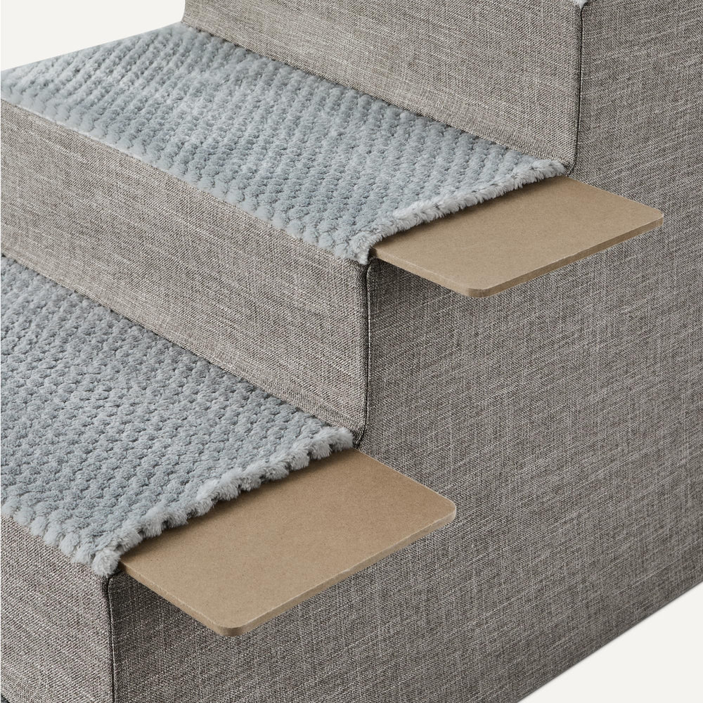 Amazon Basics dog steps with a non-slip base for secure use on any floor.