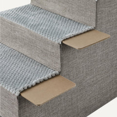 Amazon Basics dog steps with a non-slip base for secure use on any floor.
