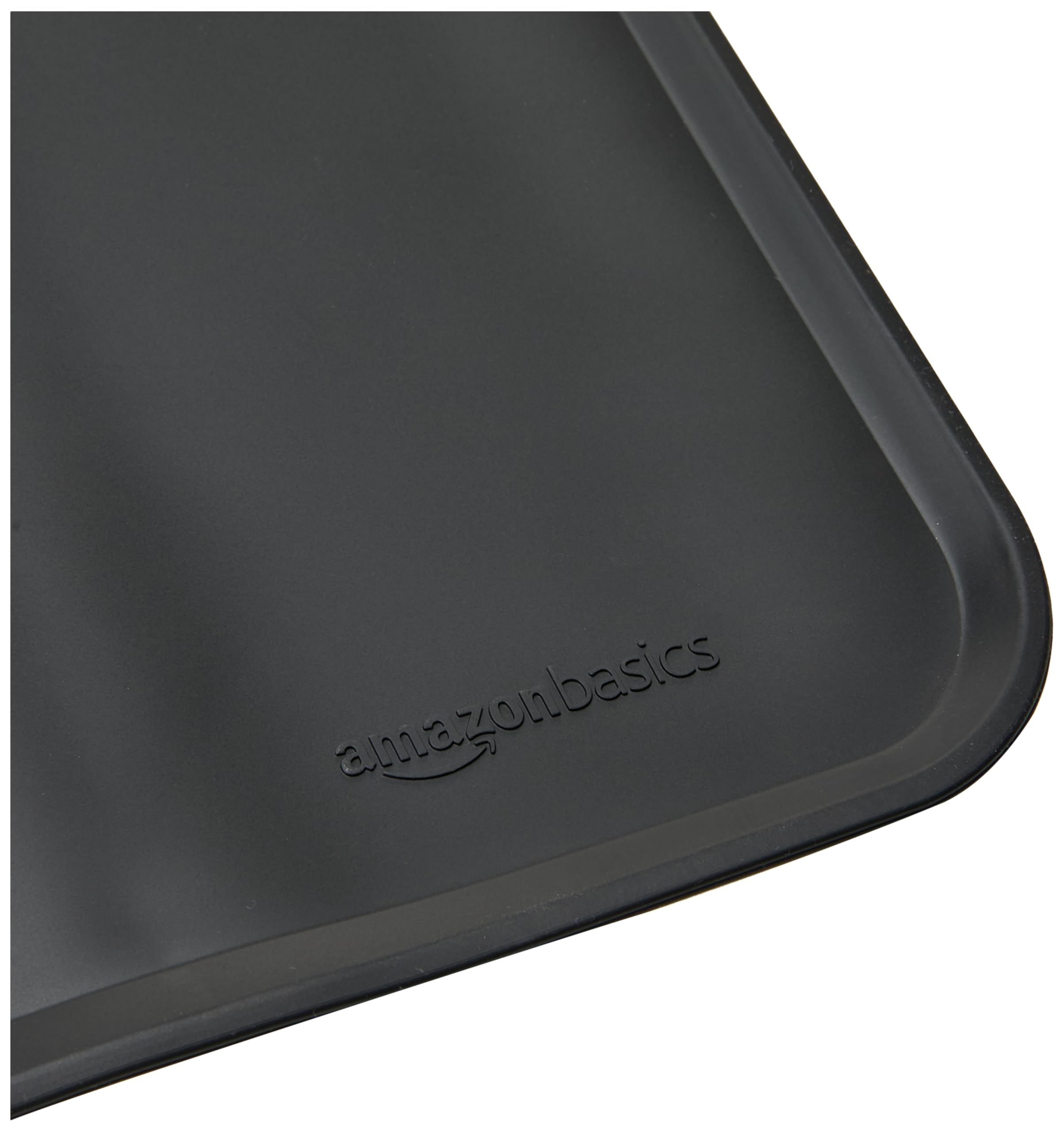 Amazon Basics non-slip feeding mat keeps bowls secure during meals.