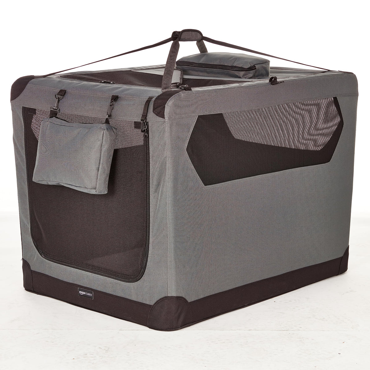 Amazon Basics portable soft dog crate with front opening for easy access and comfort
