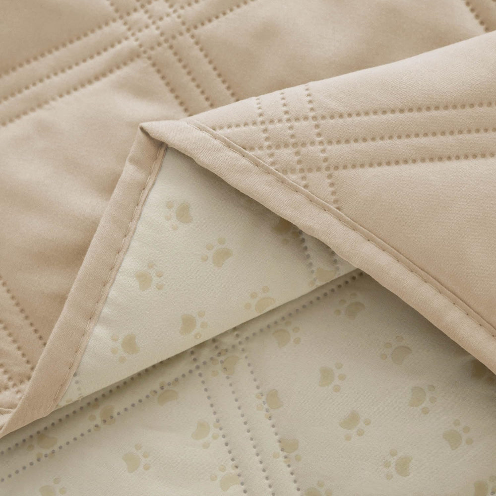 Anti-slip back of Ameritex cover keeping blanket in place on furniture