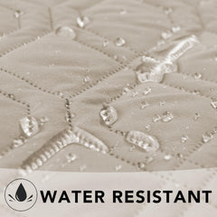 Ameritex furniture cover on sofa edge provides waterproof protection from spills.