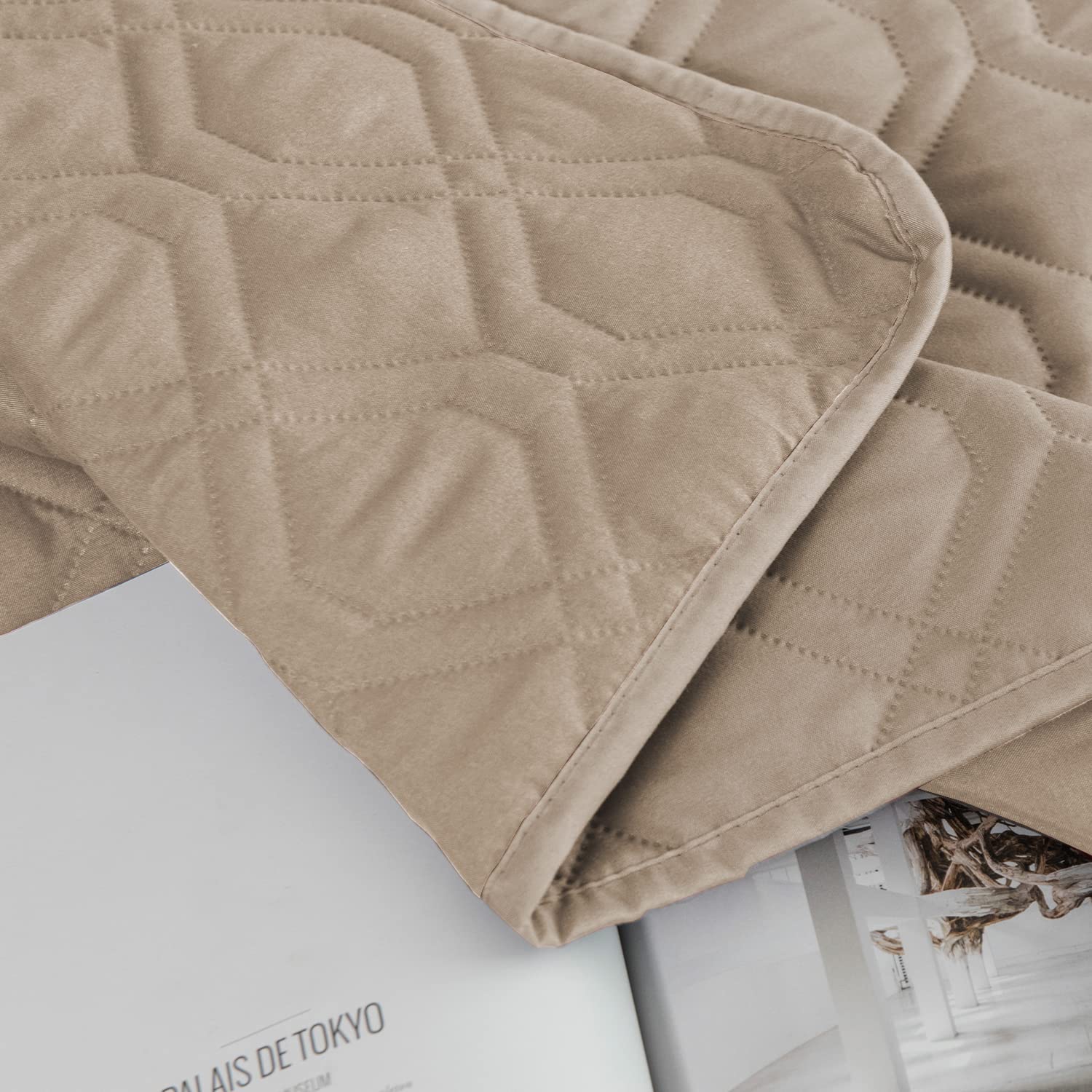 Ameritex furniture protector in use on a couch to block accidents.