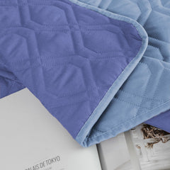 Ameritex soft microfiber cover laid over a bed for pet comfort